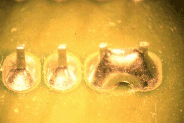 Figure 1: A solder short on a connector with a 0.025 pitch Figure 1: A solder short on a connector with a 0.025 pitch