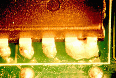 Figure 2: A rare solder short on the top side of a printed board Figure 2: A rare solder short on the top side of a printed board