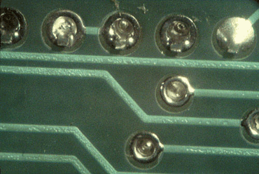Figure 1: Sunken solder joints caused by outgassing Figure 1: Sunken solder joints caused by outgassing
