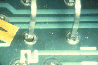 Figure 3: The solder has not fully filled the plated through hole on the left Figure 3: The solder has not fully filled the plated through hole on the left