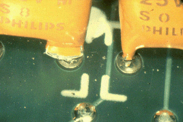 Figure 4: One hole has filled; the other has not Figure 4: One hole has filled; the other has not